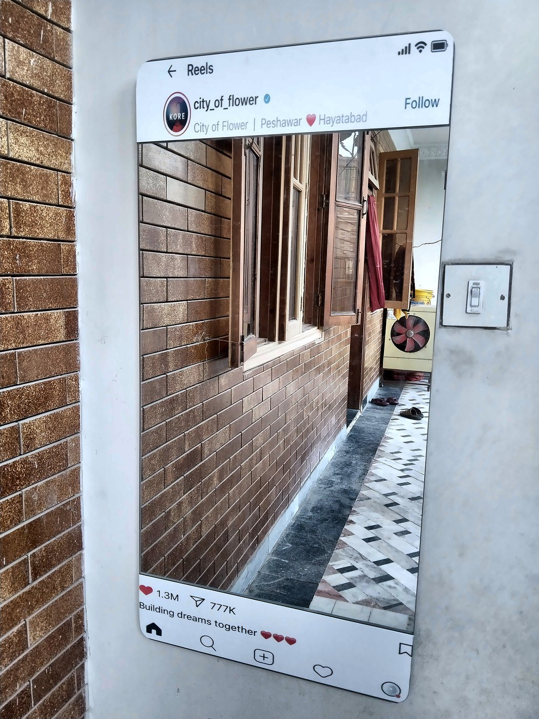 Custom Instagram frame mirror installed on wall in Peshawar, daylight view